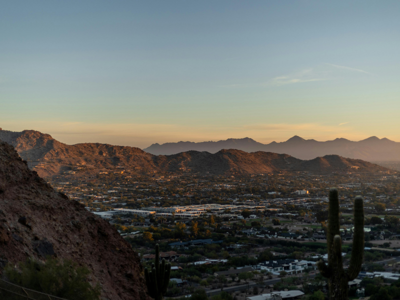Phoenix valley at sunset with mountains and saguaro cacti