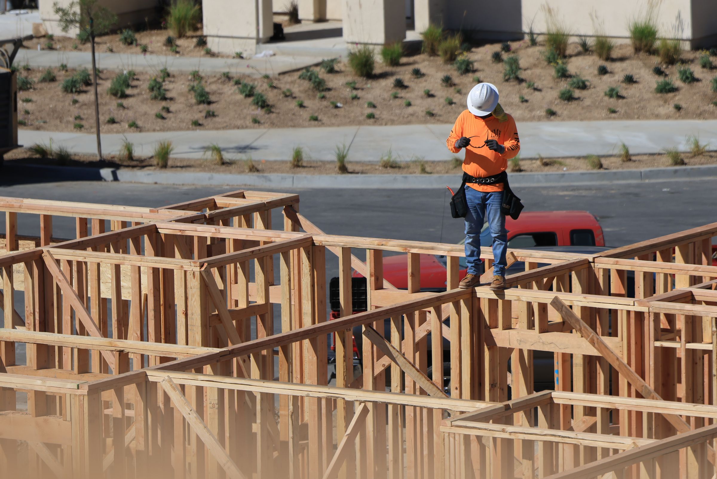 Contractor wearing safety gear at a residential jobsite